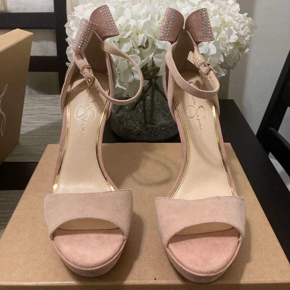 Nude, platform heels with rhinestone accents